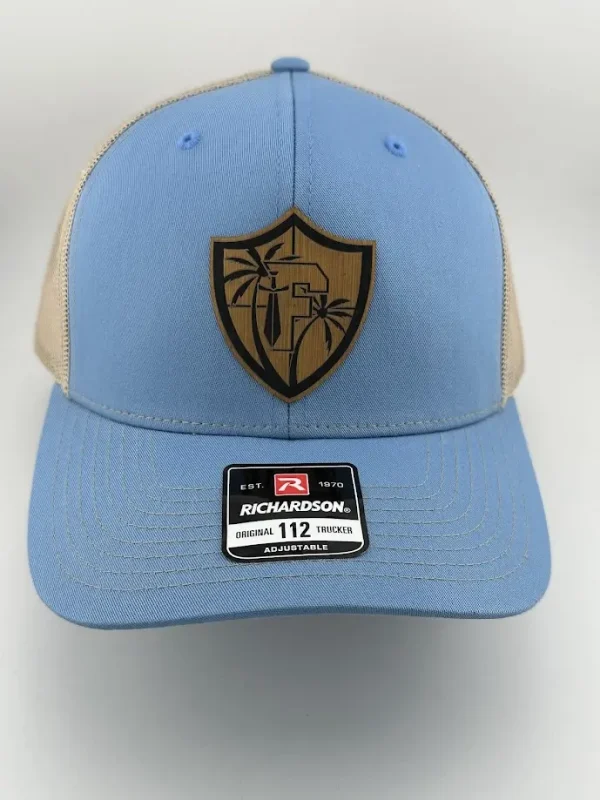Blue & Tan Trucker Hat – Titans Shield Emblem